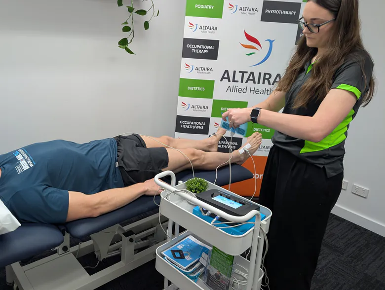 Dietitian attaching electrodes for a BIA101 BIVA body composition analysis at Altaira Allied Health, Adelaide